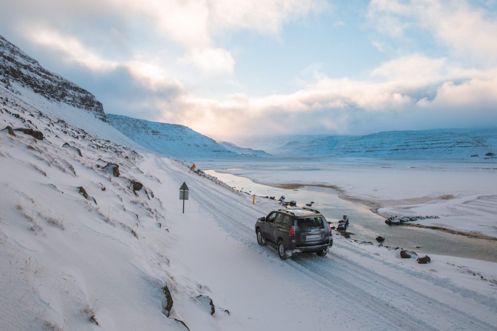 icy mountain road iceland lagoon car rental