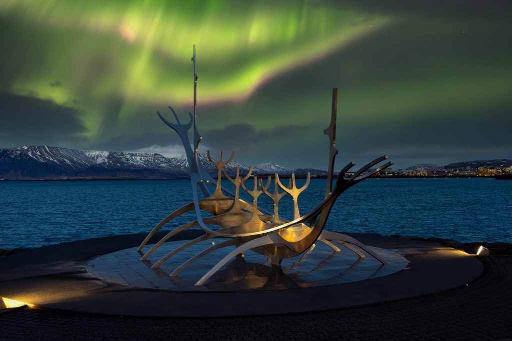 The Sun Voyager in Reykjavik under the Northern Lights.
